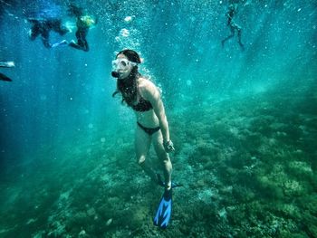 Man swimming in sea