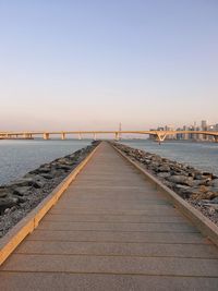 View of bridge over sea against clear sky