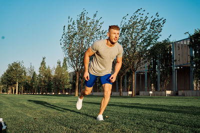 Full length of man standing on field