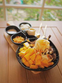 High angle view of fruits in bowl on table