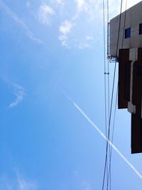 Low angle view of built structure against blue sky