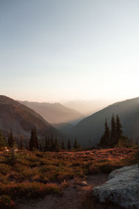 Scenic view of mountains against sky during sunset