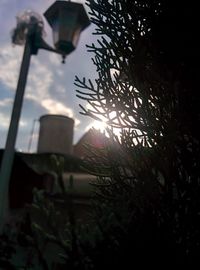 Low angle view of street light against sky