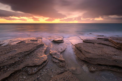 Sandstone rock formations on a beach near goudouras village, crete.