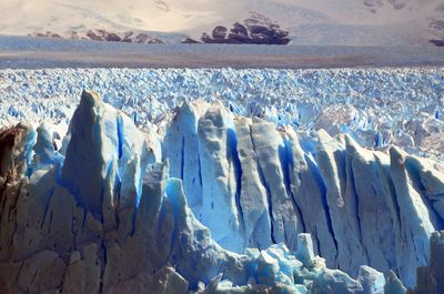 View of icebergs against sky