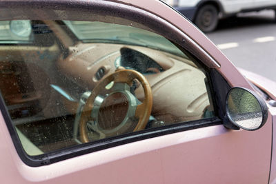 Close-up of wet car window