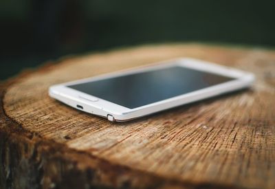 Close-up of smart phone on table