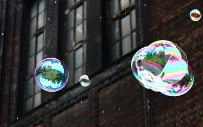 Close-up of bubbles against rainbow