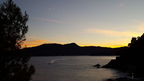 Scenic view of sea against sky during sunset