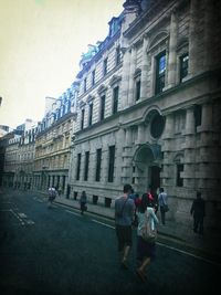 Tourists in front of historic building