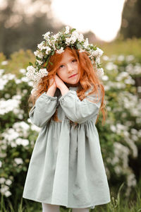 Portrait of girl wearing wreath