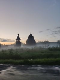 View of historic building against sky during sunset