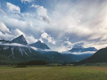 Scenic view of snowcapped mountains against sky