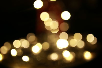 Defocused image of illuminated lights at night