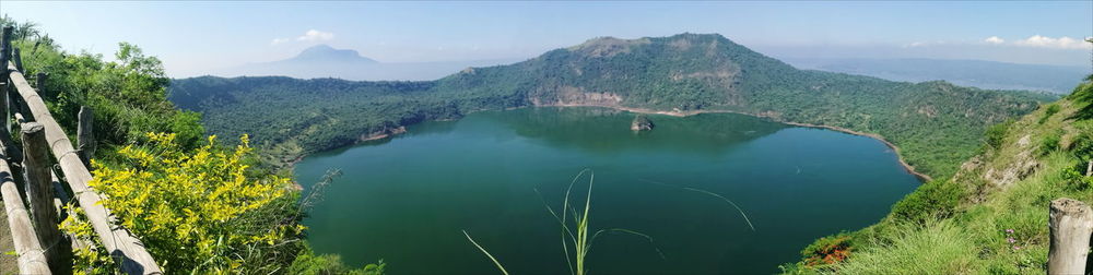 High angle view of lake amidst mountains against sky