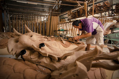 Side view of man working