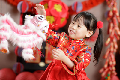 Young chinese girl with traditional dressing up celebrate chinese new year