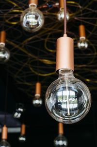 Close-up of illuminated light bulb