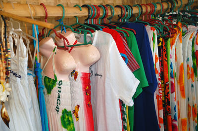 Clothes hanging in store for sale in market