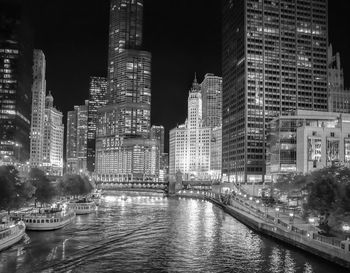 Buildings in city at dusk