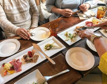 High angle view of people on table