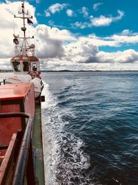 Boat in sea against sky