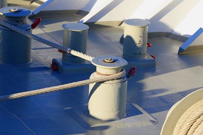 High angle view of rope tied to boat