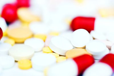 Multi colored medicine on white background