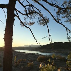 Scenic view of landscape against sky during sunset