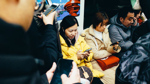 Group of people standing in bus