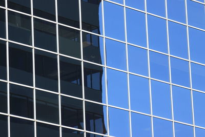 Low angle view of building against blue sky