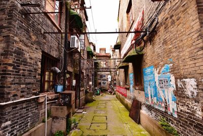 Alley amidst old buildings