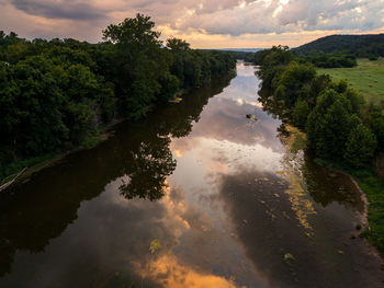 Dusk at the shenandoah river with clouds reflecting in calm waters, near front royal, virginia, usa.