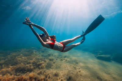 Man swimming in sea