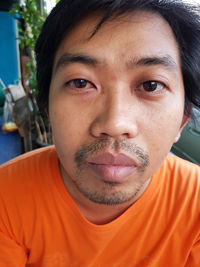 Close-up portrait of tired man