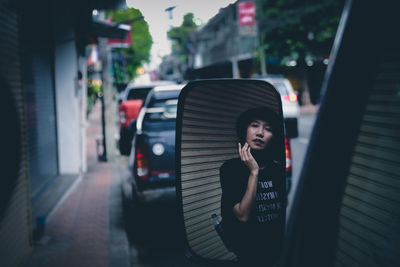 Portrait of a woman in a car