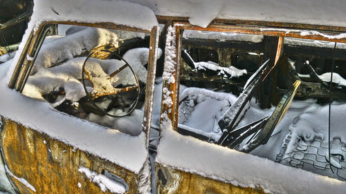 High angle view of snow on car during winter