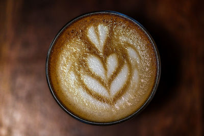 Caffe latte look from the top on the latte art work. barista motivations