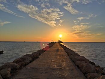 Scenic view of sea at sunset