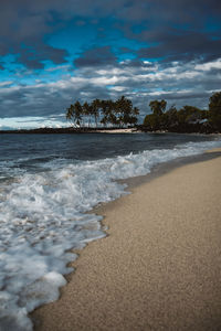 Scenic view of beach against sky