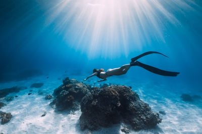 Man swimming in sea