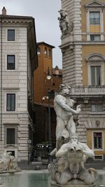 Statue of fountain in city