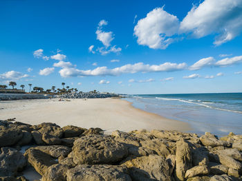 Scenic view of beach against sky