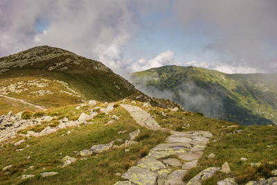 Scenic view of rocky mountains against sky