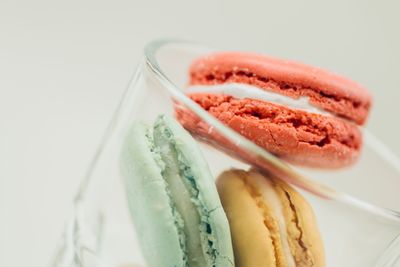 Close-up of macaroons in glass container