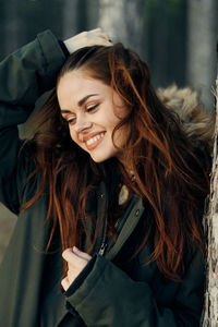 Portrait of young woman smiling