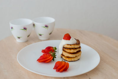 Close-up of dessert served on table