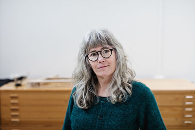 Portrait of woman wearing hat