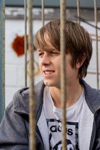 Portrait of young man looking away