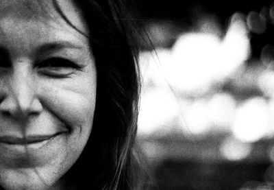 Close-up portrait of a smiling young woman